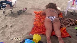 Beautiful Stepmother Flashes Big Pussy Lips on Beach Fingers Wet Beaver Eagerly