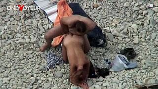 voyeur catches beach milf flashing big natural tits during summer vacation