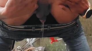sissy faggot flashes and pisses publicly outdoors