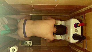 anastasia mistress rams dildo deep in toilet slave's ass