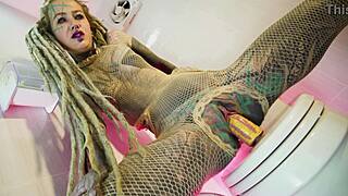 Alternative Tattoo Model Gapes Asshole with Dildo in Fishnets Solo Piss