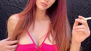 italian milf artemisia love smokes fetish cigarette outdoors in bikini showing long hair big tits