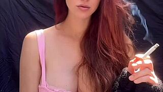 Artemisia Love LIGHTS UP a cigarette OUTDOORS with her long hair big tits solo