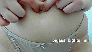 aww spittin' on this big belly button feels sooo good then fingerin' it deep for that fetish rush mmm