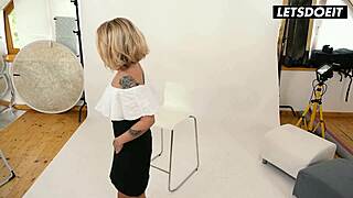 Curvy tattooed blonde strips topless at photo shoot photographer cant stop staring at her tits
