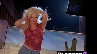 Blonde model poses naked with big boobs