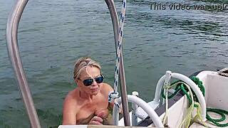 Sexy granny swims naked in a lake