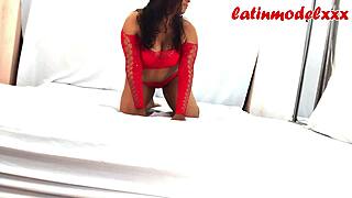 sexy chubby model poses in red lingerie for photoshoot